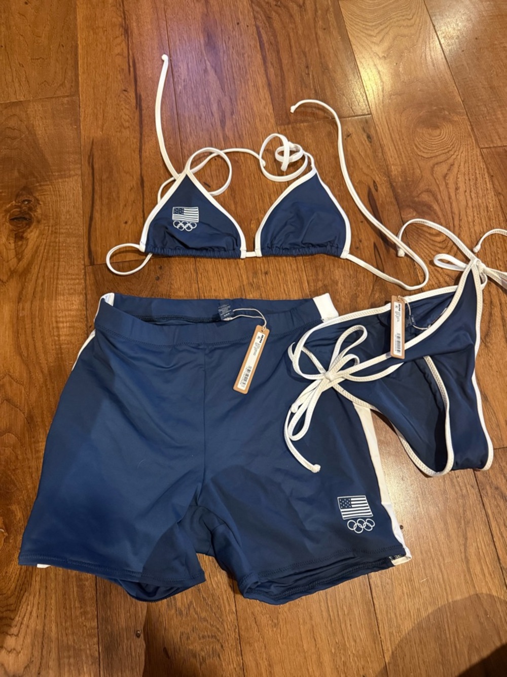 SKIMS Navy Blue Swim Bottoms with Brand Tag